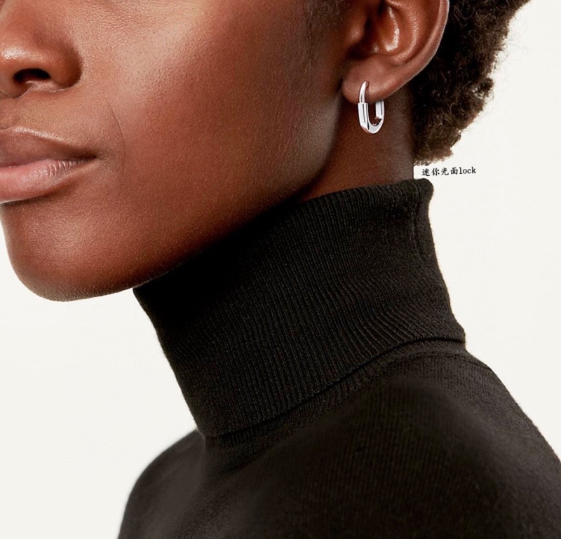 T*f*ny earrings